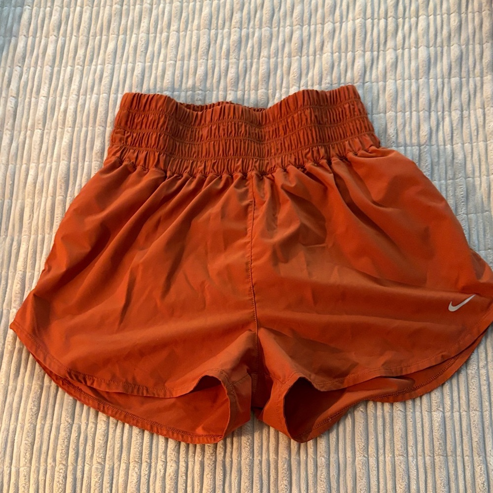 Nike Women's Vibrant Orange Athletic Shorts